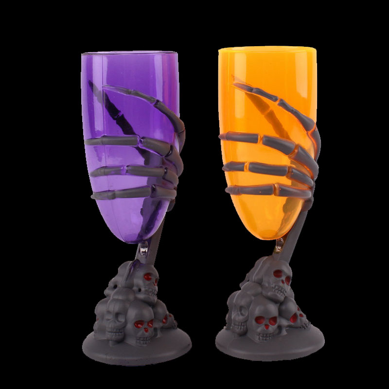 Halloween -tabelwaren beker skelet met handboeken